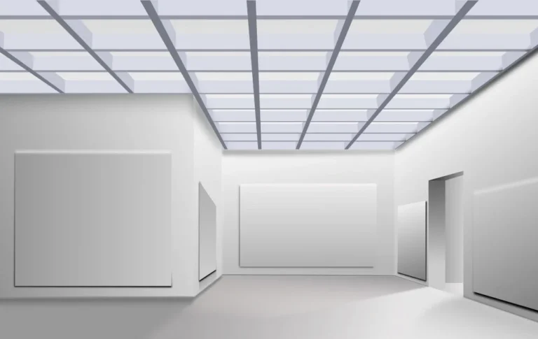 Modern minimalist gallery room with smooth white walls, empty frames, and grid ceiling panels for diffused lighting, illustrating ideal dry lining results.